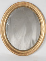 Gilded 19th-century oval French mirror