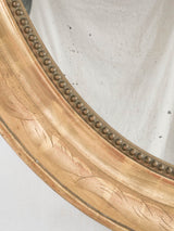 Elegant pearl-beaded French gilded mirror