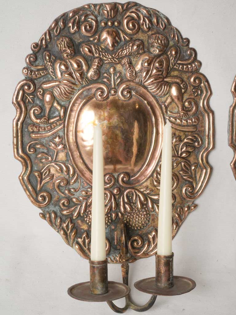 Patinaed scrolling acanthus light fixtures