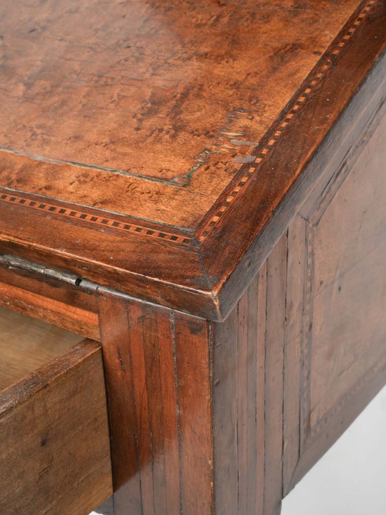 Sophisticated brass-escutcheon drawer  