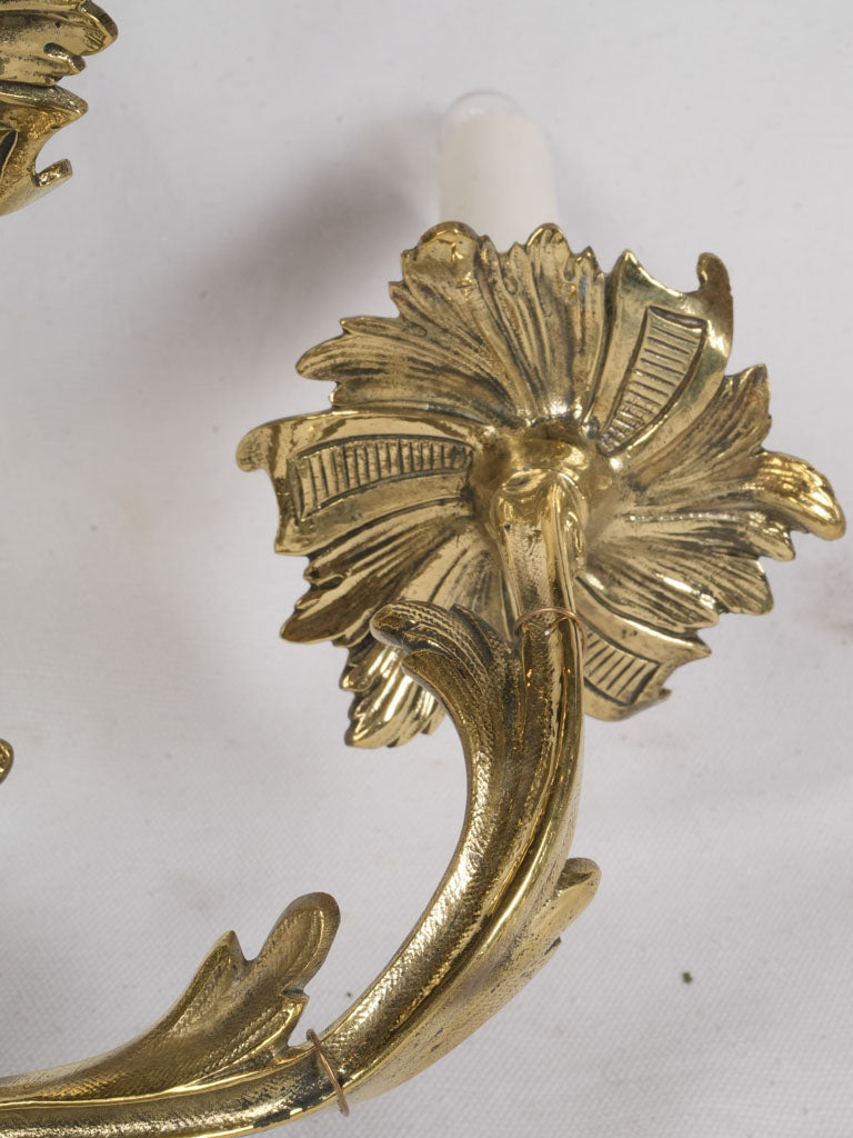 Asymmetrical rococo style sconces  