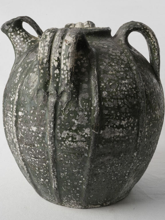 Distressed finish terracotta oil jar