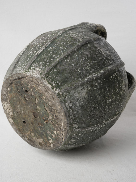 Thumb-marked terracotta oil container