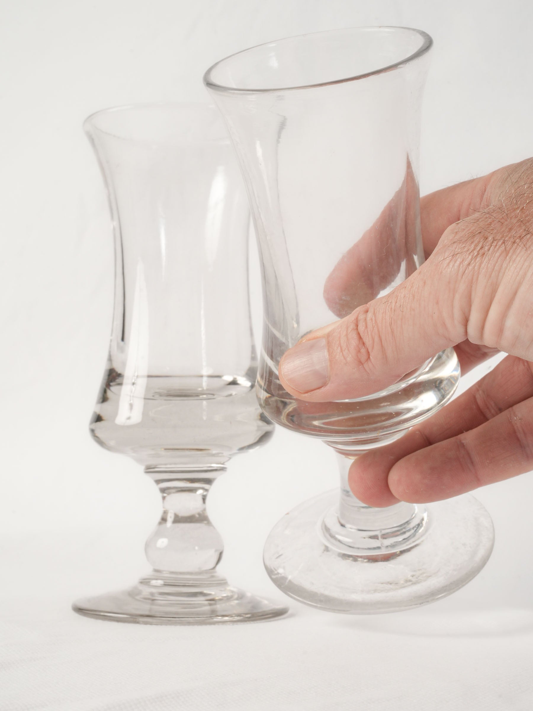 Near pair of French antique blown glass absinthe bistro glasses