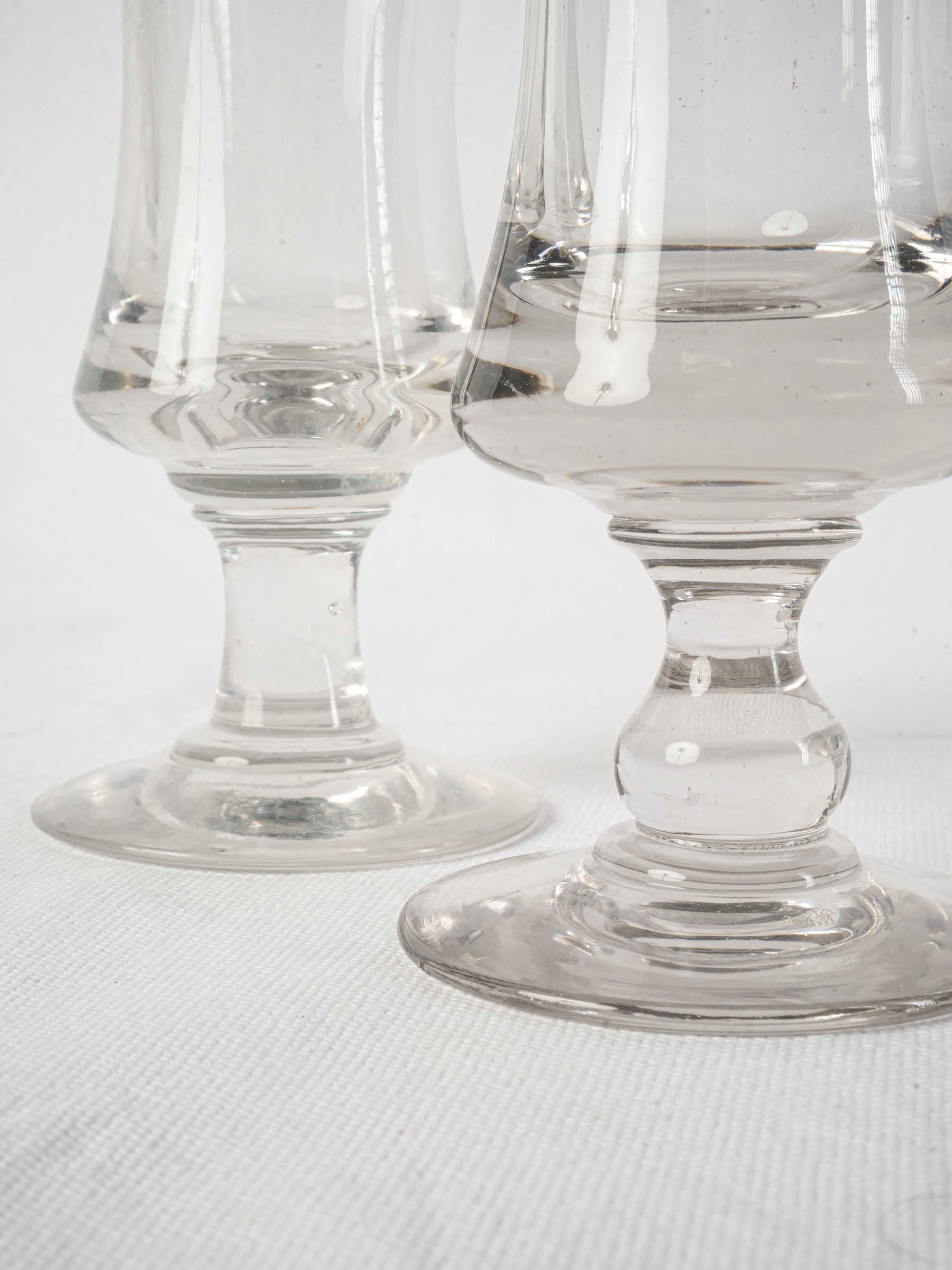Near pair of French antique blown glass absinthe bistro glasses