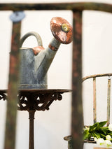 Aged Parisian decorative watering can