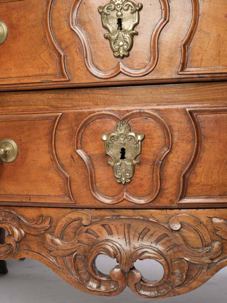 Refined sculptural walnut commode