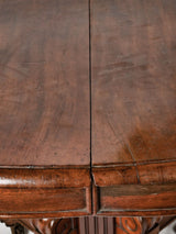 Detailed extendable mahogany dining table