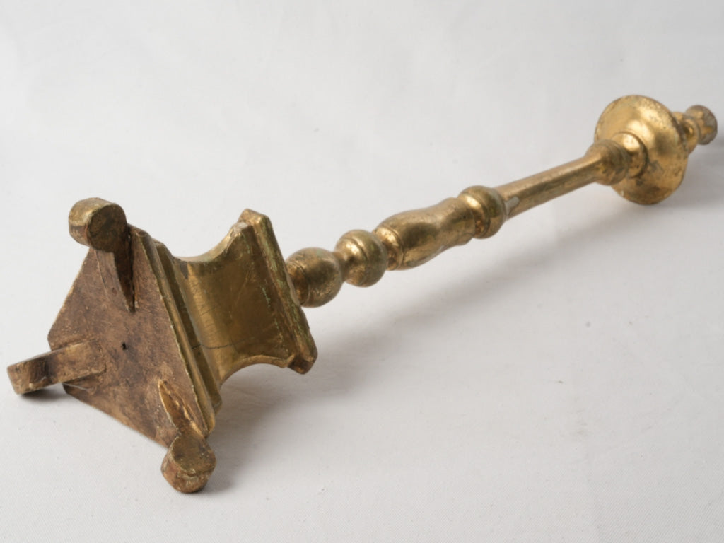 Distinctive patina gilt wood candlestick