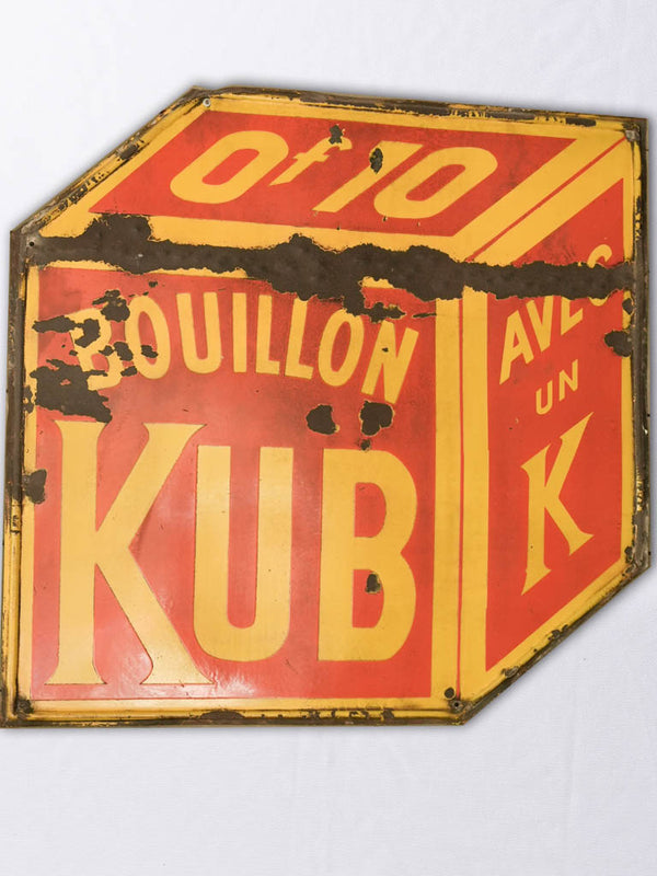 Vintage red-and-yellow tole advertisement sign