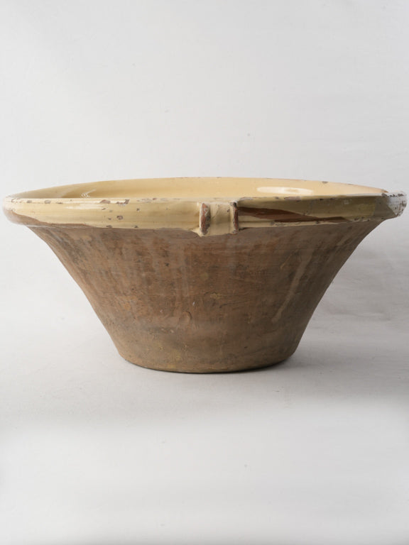 Patina-marked French culinary bowl  