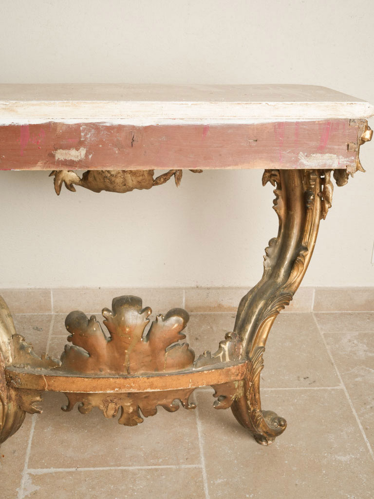 Dynamic gilded Rococo console