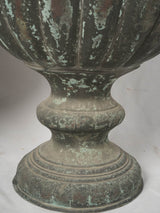 Gadrooned bronze garden urns