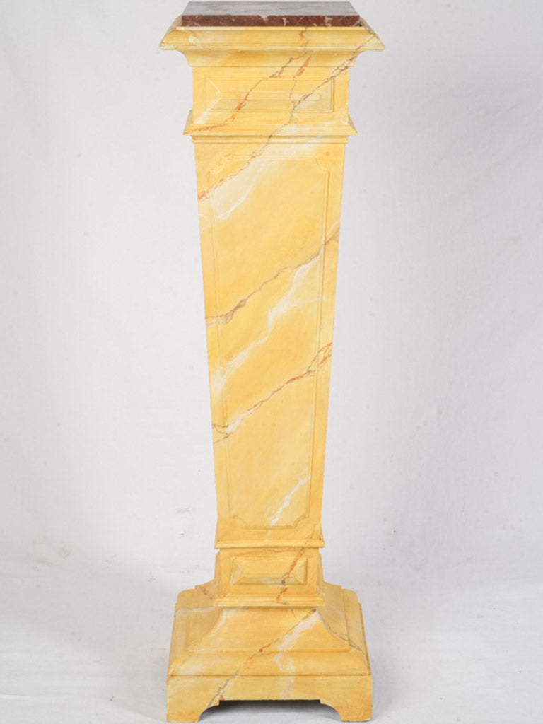 Elegant red marble-topped plinth  