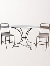 Oval garden table w/ two iron chairs 47¼" x 30"