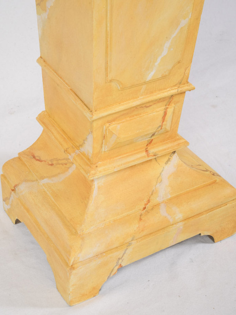 Rich antique-style marble-topped base  