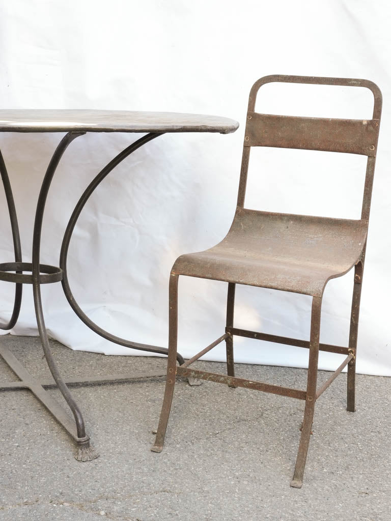 Oval garden table w/ two iron chairs 47¼" x 30"
