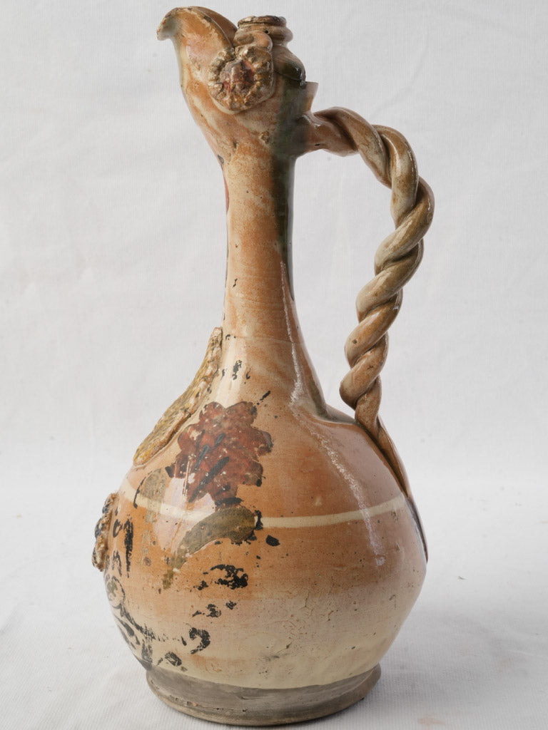 Polychrome floral decorated earthenware jug