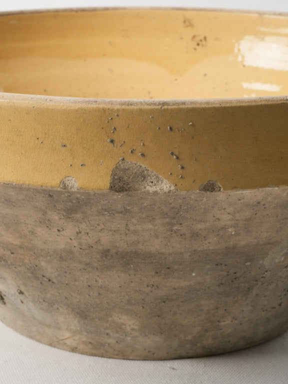 Iconic beige glazed earthenware piece  