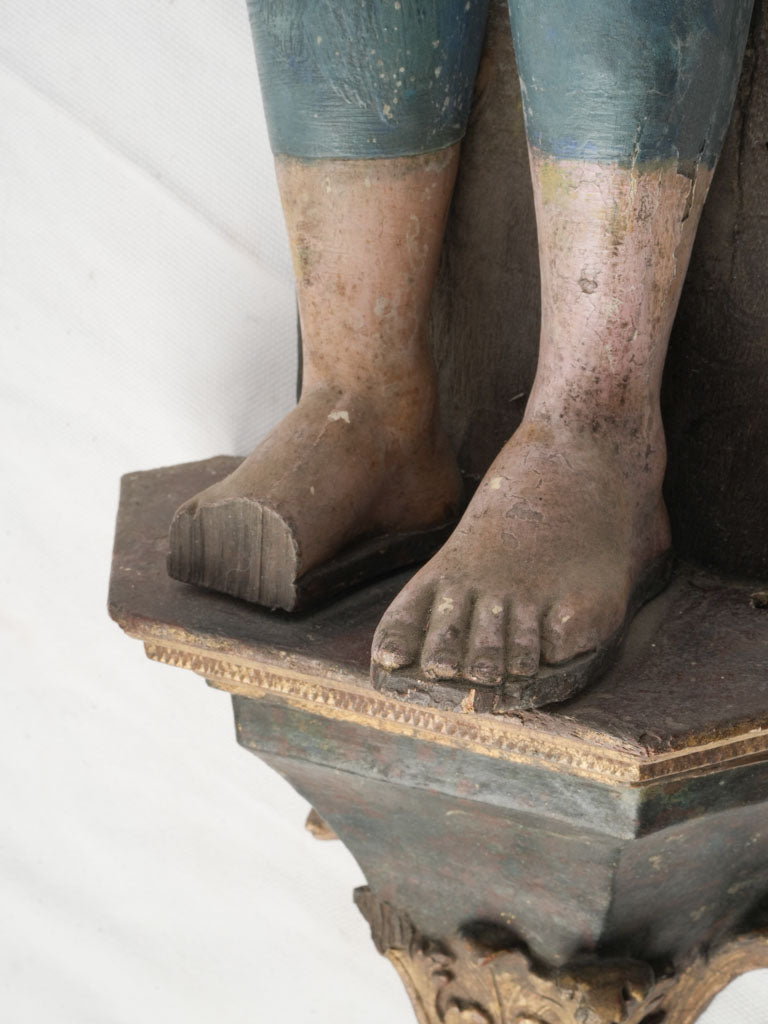 Timeworn polychrome religious figure