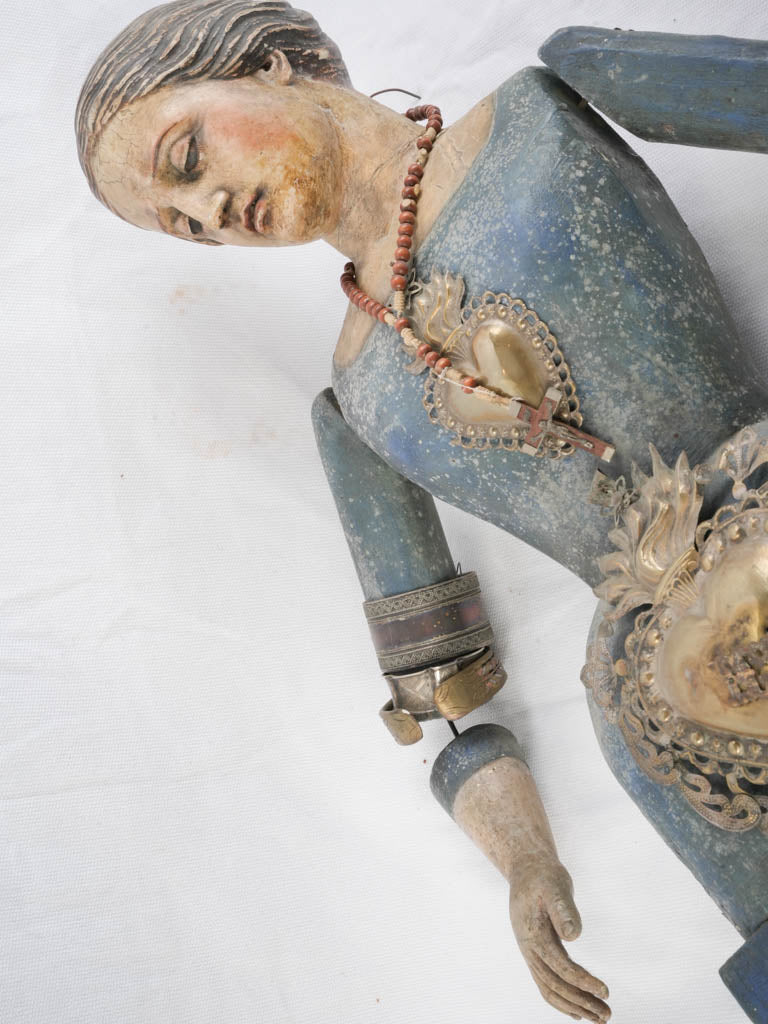 Distressed articulated wooden statue