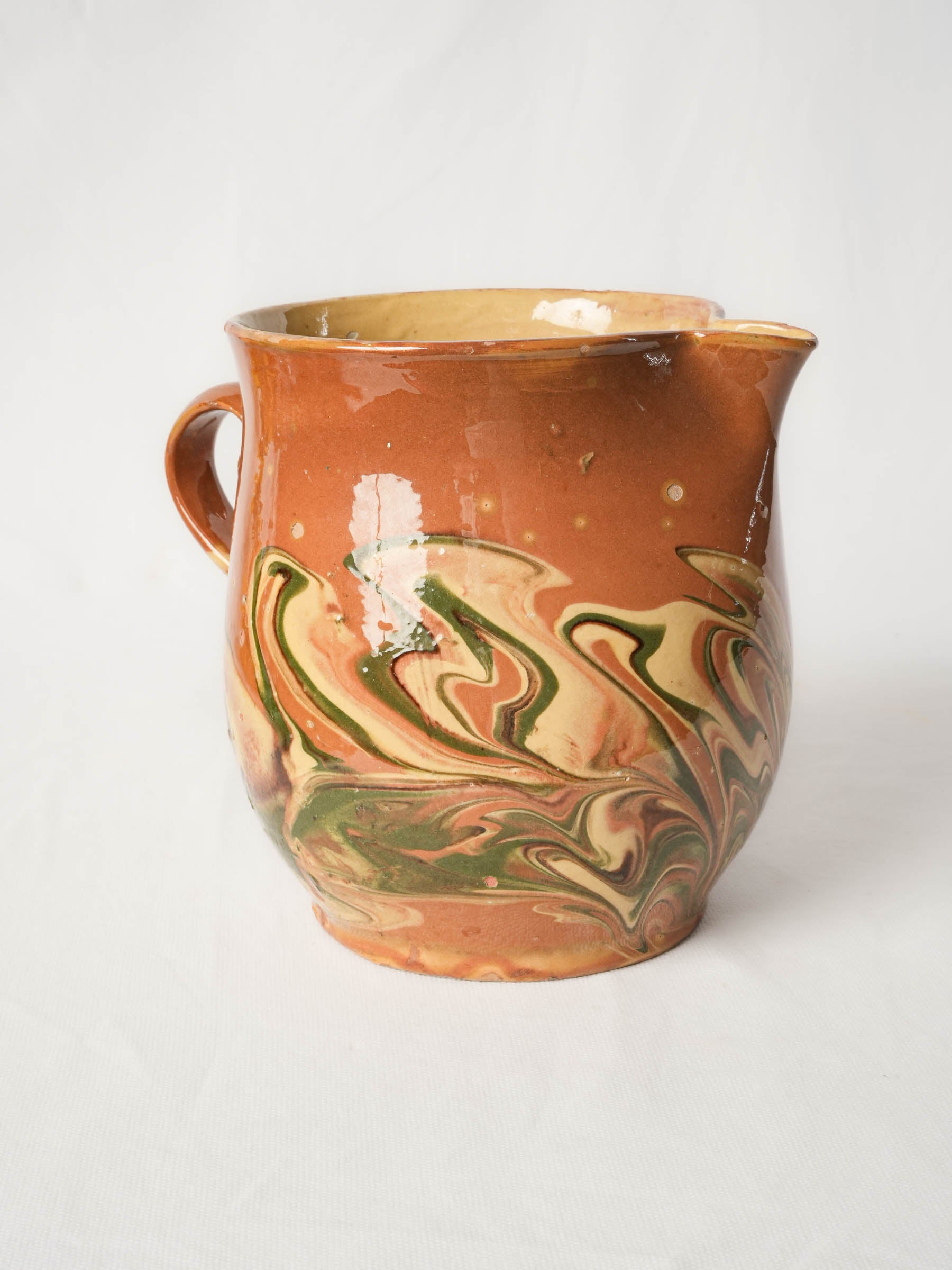 Antique Savoyard glazed earthenware jaspé creamer - 8"