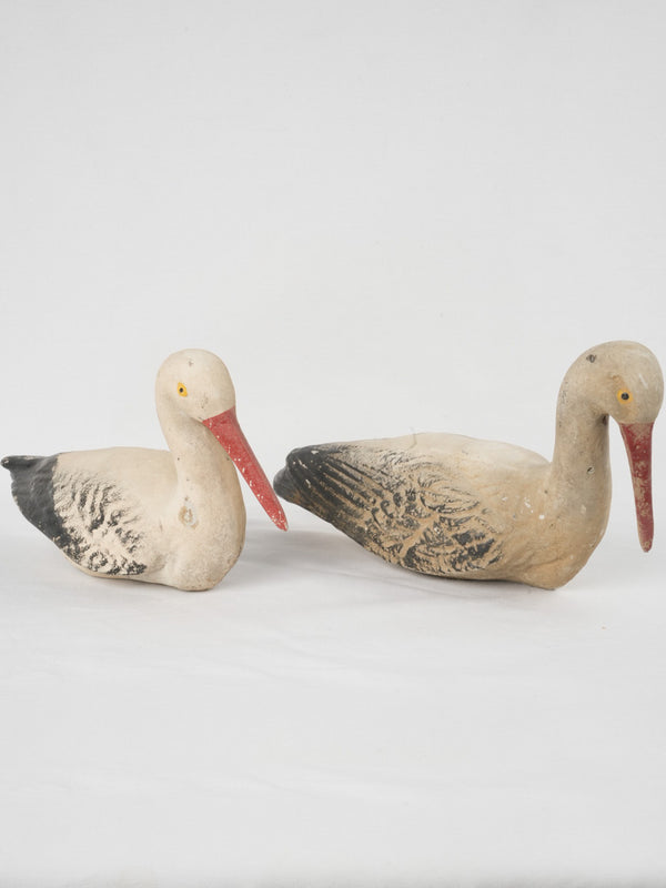 Collection of two garden stork sculptures
