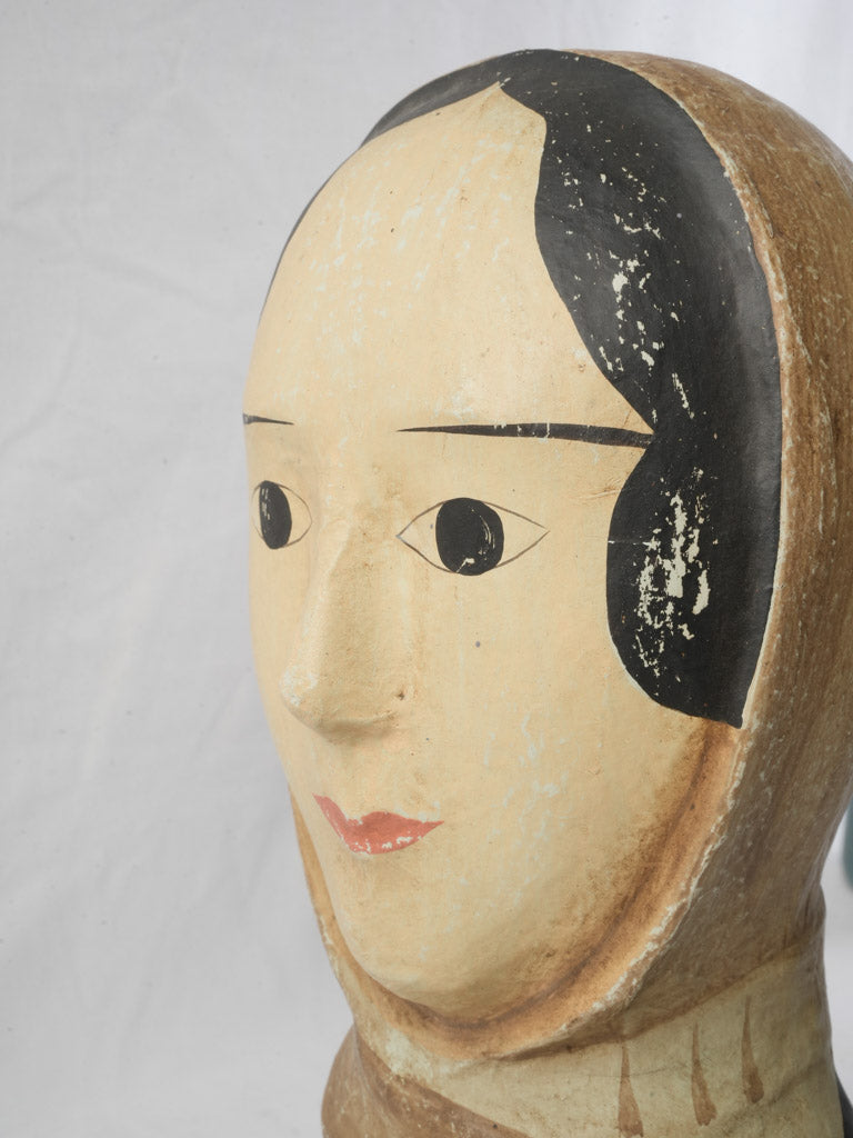 Floral-collared papier-mâché stand