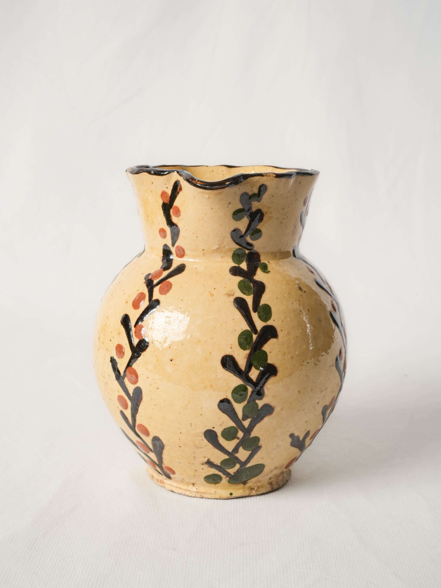 Pretty antique pitcher from Savoy - Yellow w/ foliage motifs 7"