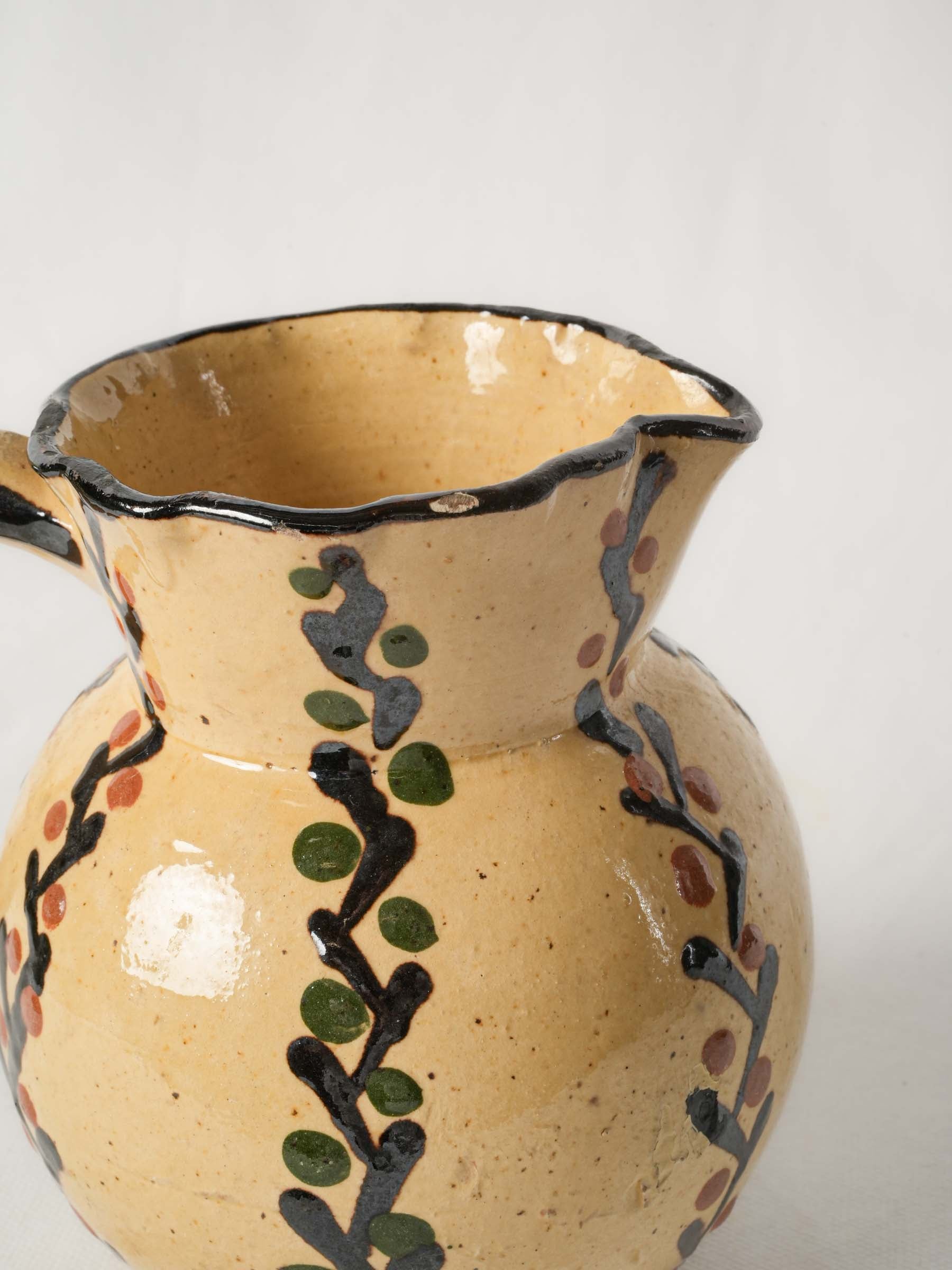 Pretty antique pitcher from Savoy - Yellow w/ foliage motifs 7"