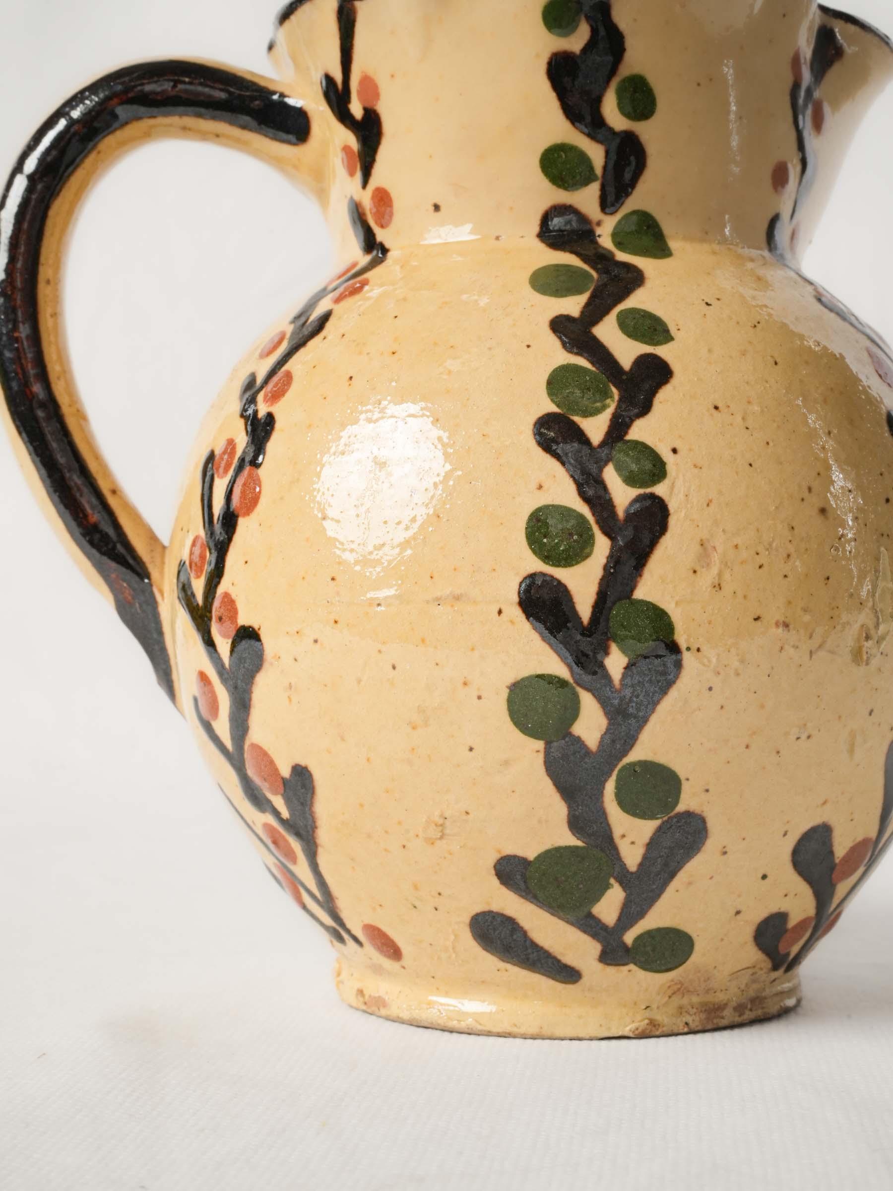 Pretty antique pitcher from Savoy - Yellow w/ foliage motifs 7"