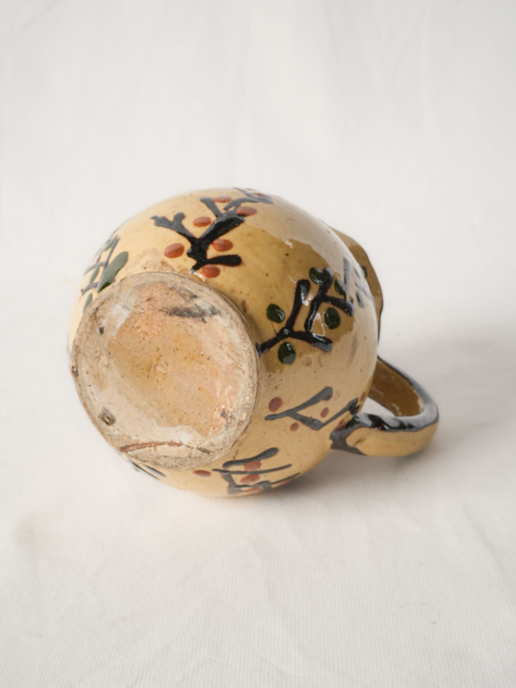 Pretty antique pitcher from Savoy - Yellow w/ foliage motifs 7"