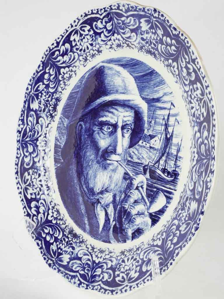 Blue & white Delft plate w/ bearded man smoking 13¾"