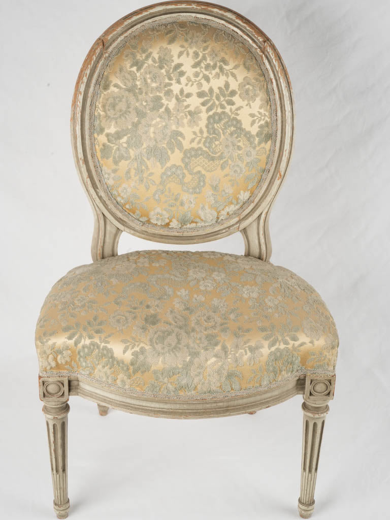 Vintage French upholstered medallion-back chairs