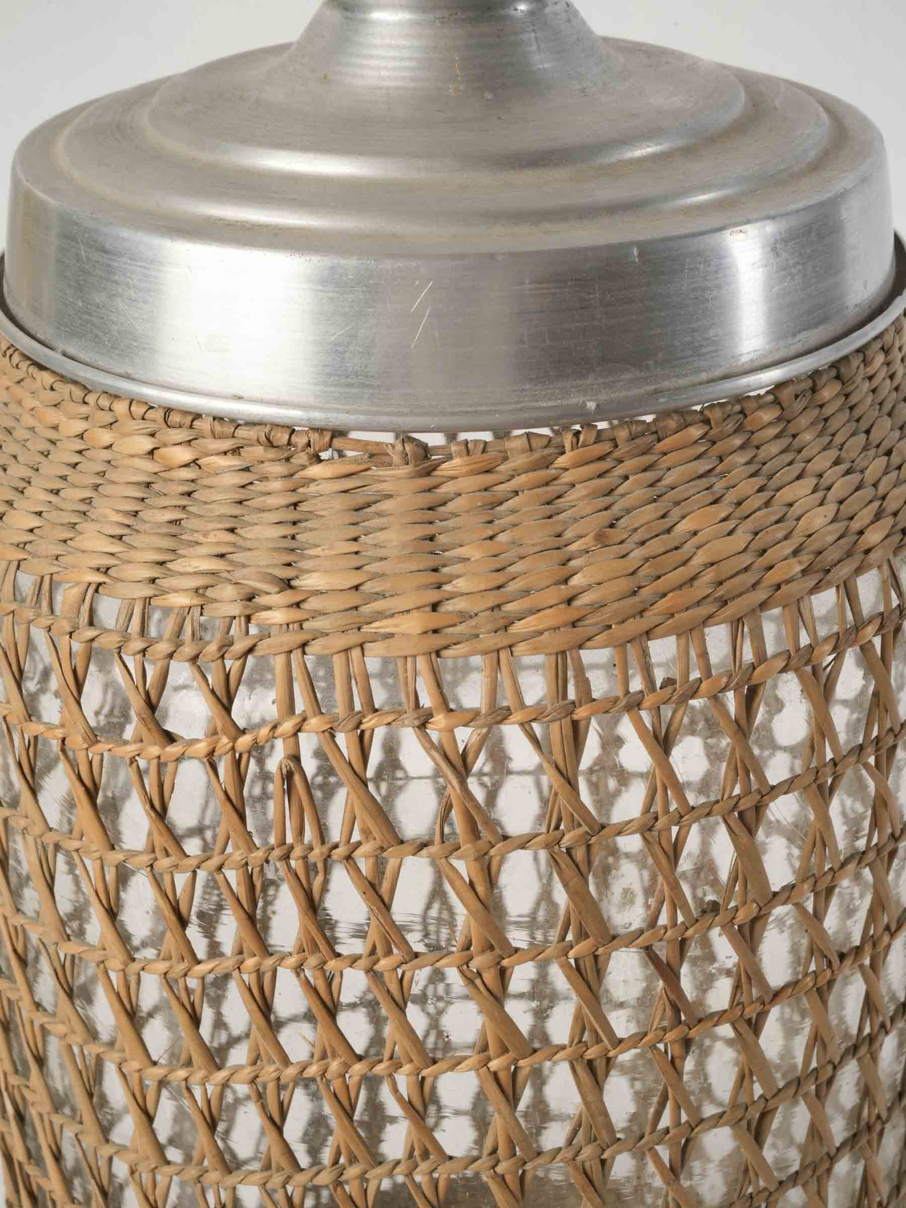 1960s rattan clad glass canister with aluminum lid - 15¾"