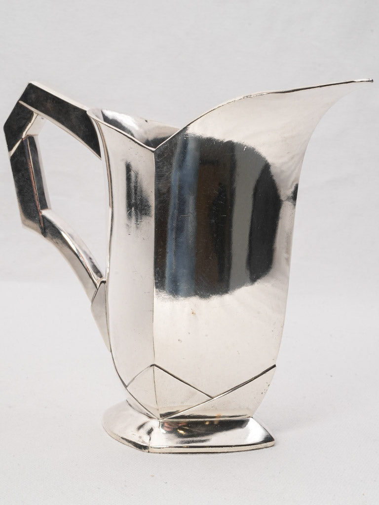 Authentic 1930s silver-plated pitchers  