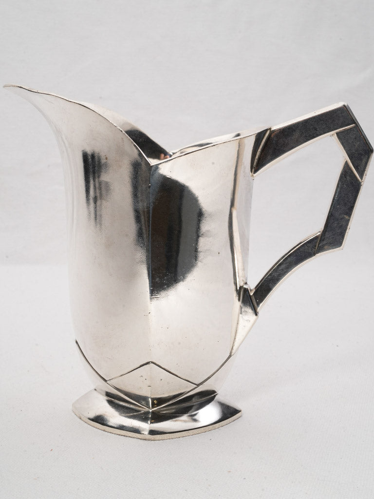 Sophisticated early 20th-century pitchers  
