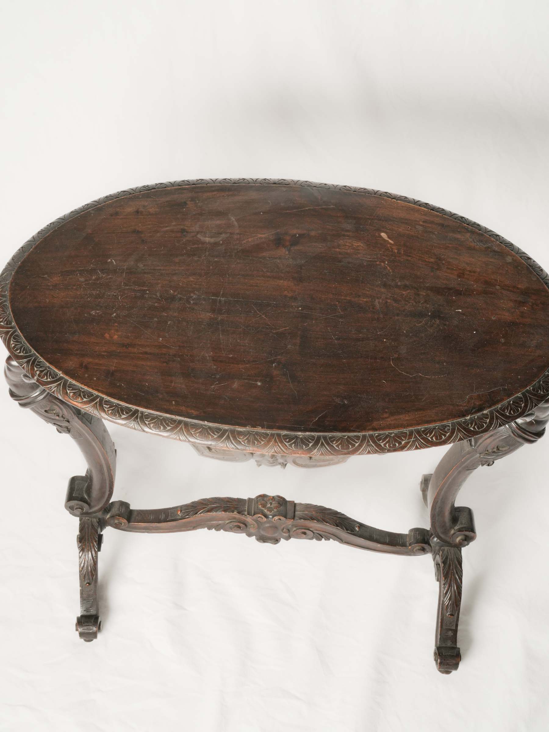 Napoléon III French beech oval side table w/ winged caryatids
