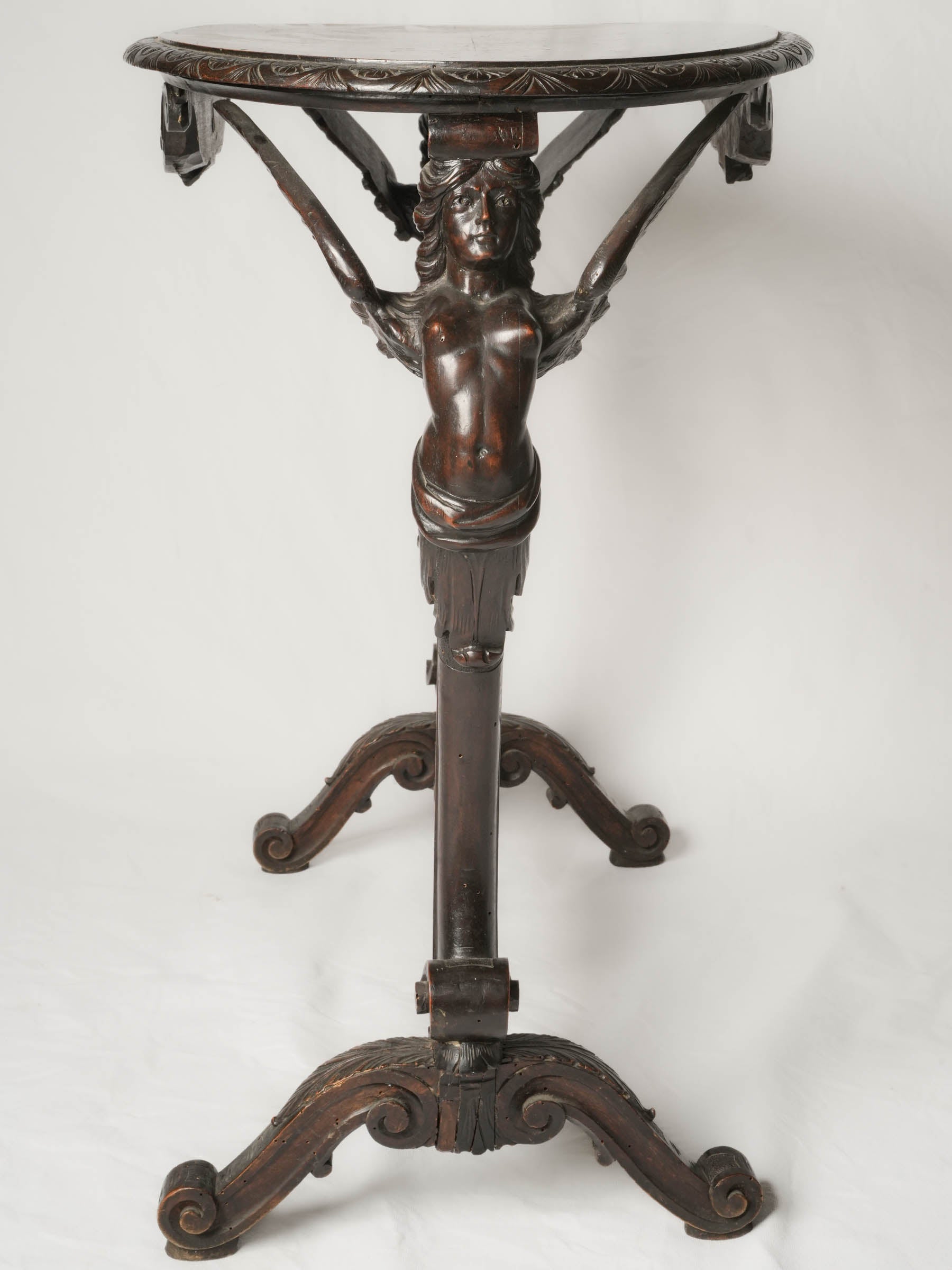 Napoléon III French beech oval side table w/ winged caryatids
