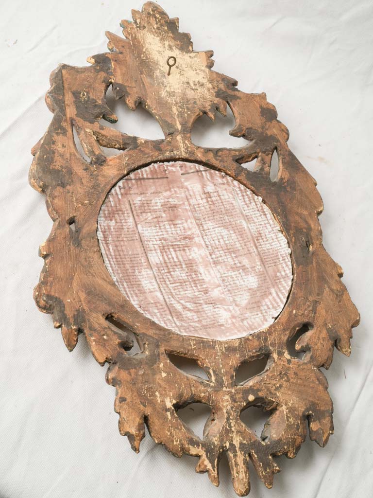 Luxurious patinated witch’s wall mirror