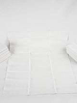 12 antique French serviettes - white w/ ML monogram
