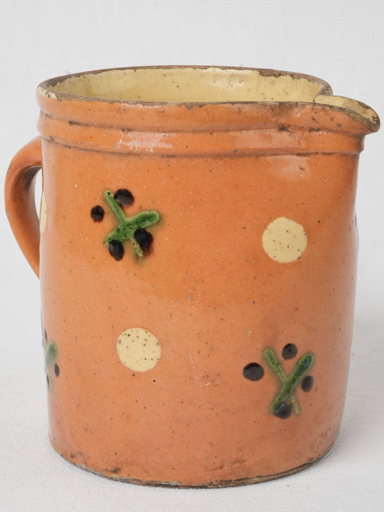 Rustic antique terracotta milk jug  