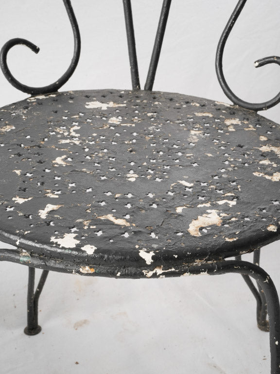 Artistic distressed garden armchairs  