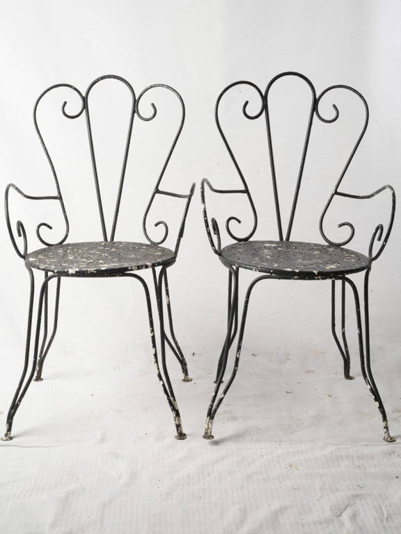 Mid-century black wrought iron chairs  