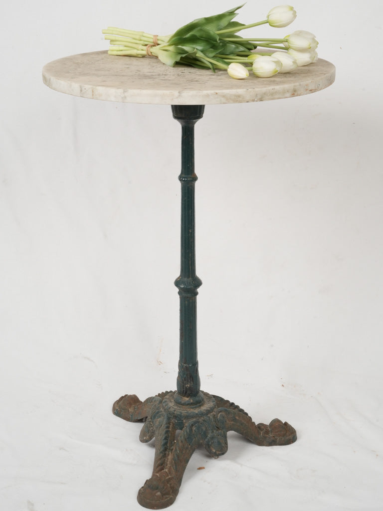 Aged, classic, green-blue cast iron table