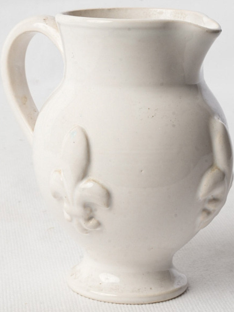 Antique floral-motif faïence pitcher