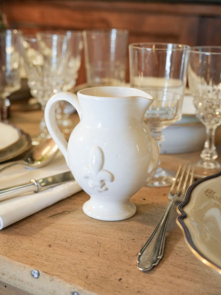 Vintage ivory-glazed faïence jug