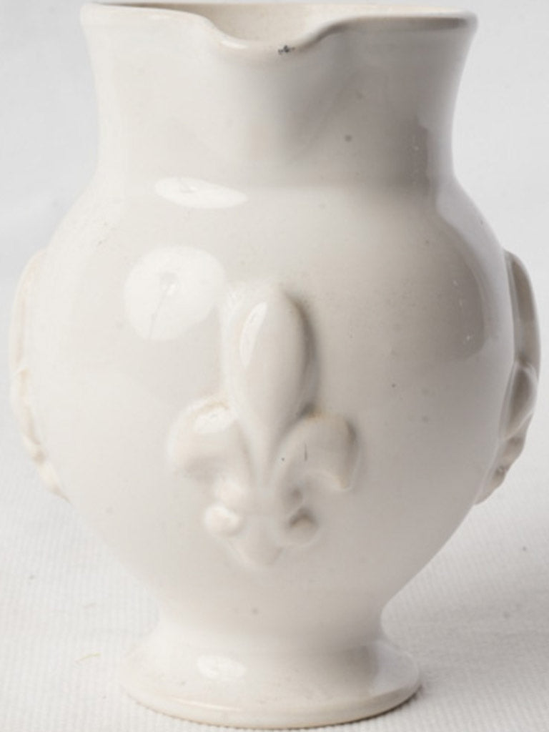 Iconic fleur-de-lis creamer 