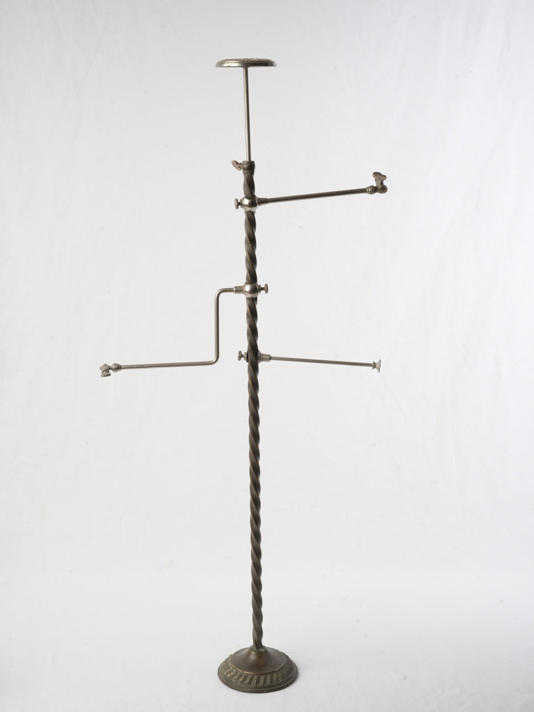 Harmonious twisted central stem stand  