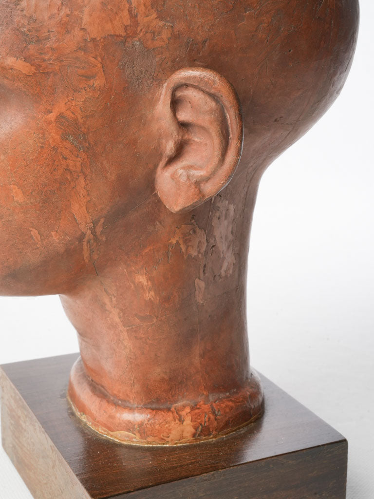 Textured brown patina head bust  
